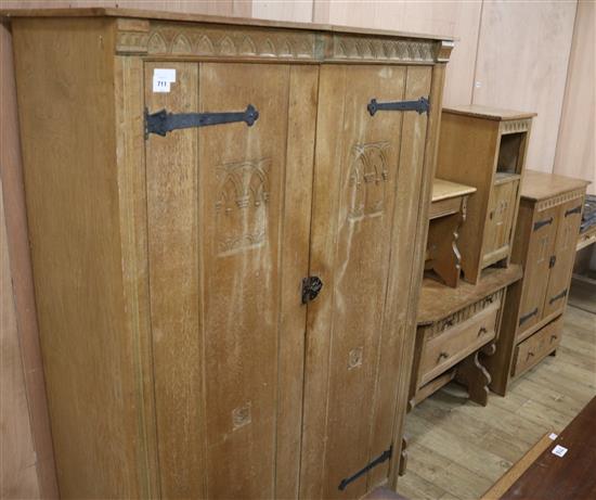 A five piece carved oak bedroom suite